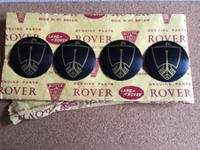 ROVER P5B / P6 ROSTYLE WHEEL CENTRE CAP BADGES.   NEW.   562127.   SET OF FOUR.
