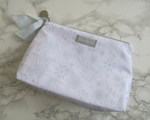 Clarins white and silver - and,