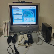 Nintendo Wii Black, 1  MotionPlus Pad, 1 Pad, 2 Nun Chucks, 5 Free Games See Vid