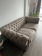 Large grey two-seater chesterfield sofa from Furniture Village (used)