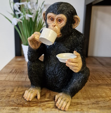 Cup tea drinking monkey - of,