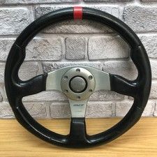 Genuine Momo Race black leather, 3 spoke, 350mm steering wheel. Dated 1997.   7C