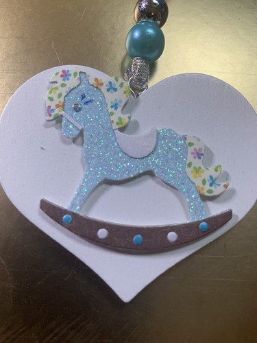 Heart baby rocking - horse, sign