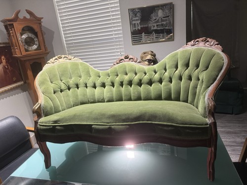 Antique carved wood loveseat