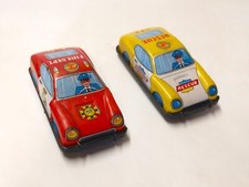 2 Vintage Friction Tin