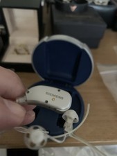 Siemens hearing aid left or right  includes 2 receivers 