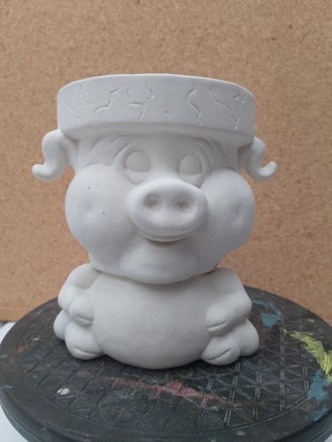 Unpainted ceramic bisque - bisque, pig