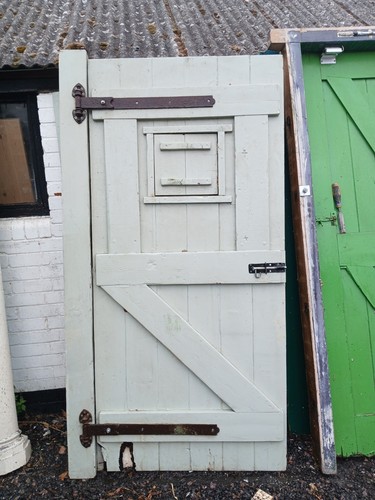 Exterior ledge and brace door - and,