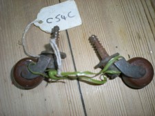 PAIR OF BRASS  & BROWN PORCLIAN CASTORS