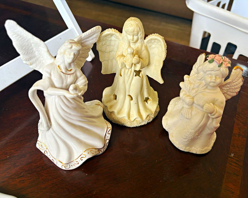 White ceramic angel figurines - white,