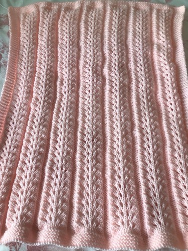 Hand knitted baby girl - hand,
