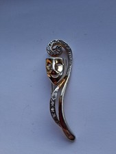 Rhinestone gold tone comedy - rhinestone,