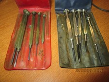 jewellers screwdrivers in plastic wallets. Draper D23 and a brass handled set