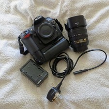 Nikon D200 + Nikkor 18-70mm lens kit. LOW SHUTTER COUNT.