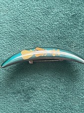 A Crescent Shaped Brooch Incorporating Dried Flowers Within Resin Unusual