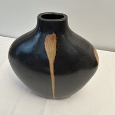 Brown pottery vase in good condition 35 cm height