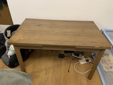 Extensible wooden dining table
