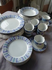 40 piece, 8 setting, China Dinner Service. White with Blue and Purple pattern