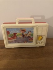 Vintage wind-up musical toy with a movable screen from 1985, a reminder of MyKid