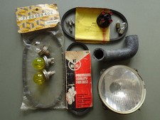 RENAULT 4 PARTS 3X FAN BELTS, H/LAMP, 6 VOLT BULBS, DISTRIBUTOR CAP RADIATOR HOS