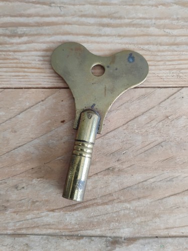 Vintage brass clock winding - vintage,