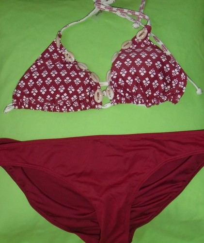 Next triangle maroon red - next,