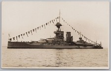 HMS BENBOW Iron Duke Class Battleship Decorated with Flags RP Postcard