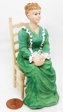 Dolls house sitting resin lady - house,
