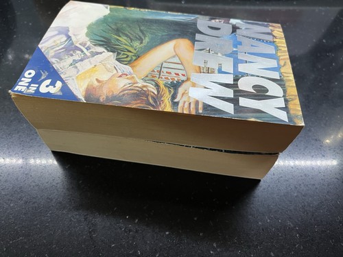 Nancy drew books x 2 - nancy,