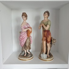 Bruno Merli signed Capodimonte porcelain Man and Woman Fugurines