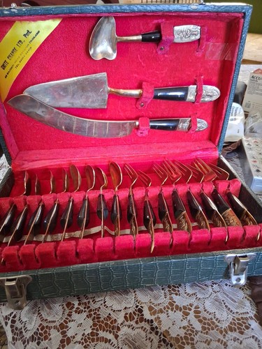 Gold plated spoons and - plated, forks