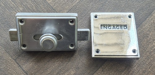 Chrome toilet door lock - toilet,