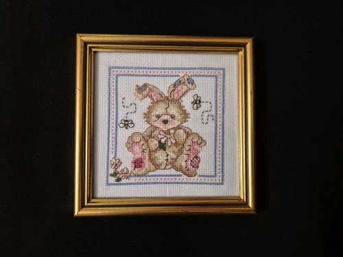 Completed and framed - and, cross