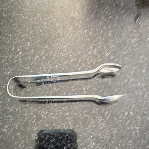Solid silver sugar tongs - solid,