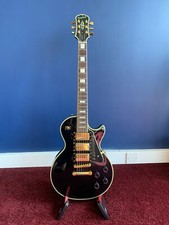 2002 Epiphone Black Beauty Guitar with case and accessories.