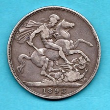 AN 1893 STERLING SILVER CROWN COIN. QUEEN VICTORIA VEILED HEAD. 'LVI' EDGE.