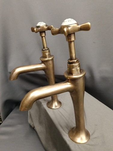 Aged bare brass pillar - , taps