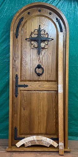 Rustic oak lumber arch door