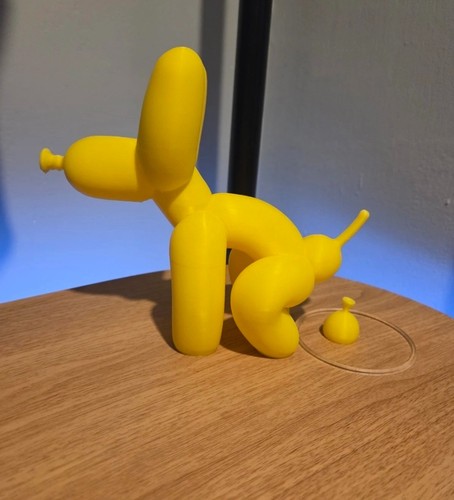 Novelty pooping balloon dog