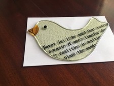Glass bird ornament with