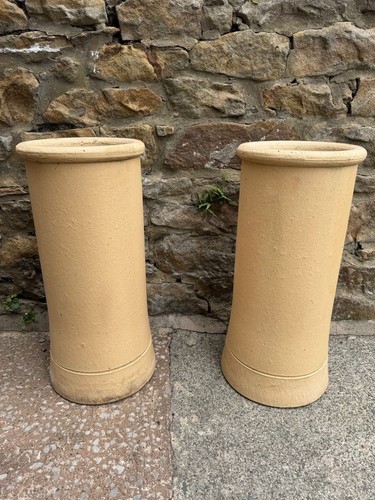 Two chimney pots - two,