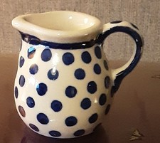 Polish Pottery Tiny Jug. Blue Spots On White Background.