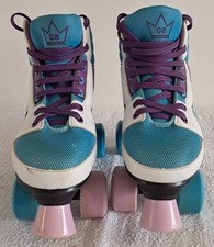 Kingdom GB candy quad wheels  size 4 purple blue, pink+ white.