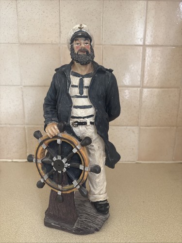 Fisherman steering boat - steering,