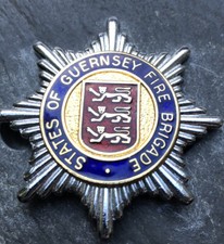 OBSOLETE  STATES OF GUERNSEY FIRE BRIGADE CAP BADGE.