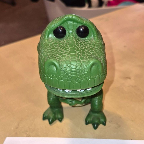 Green plastic dinosaur - green,