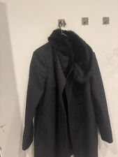 Jacquard black coat with faux fur round the neck