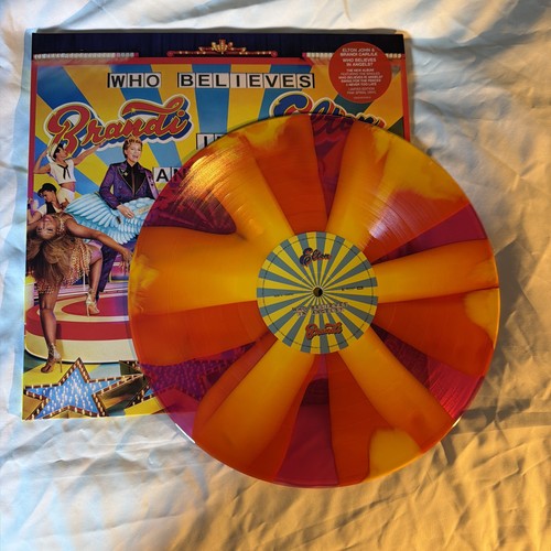 Elton john who - believes, in