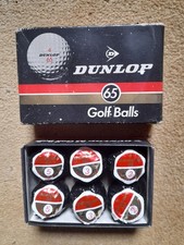 SIX VINTAGE DUNLOP 65 GOLF BALLS