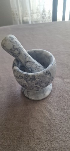 Nice heavy marble pestle and - heavy,